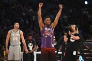 Former Utah Jazz shooting guard Donovan Mitchell (middle)